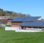 Barns with solar panels in Switzerland